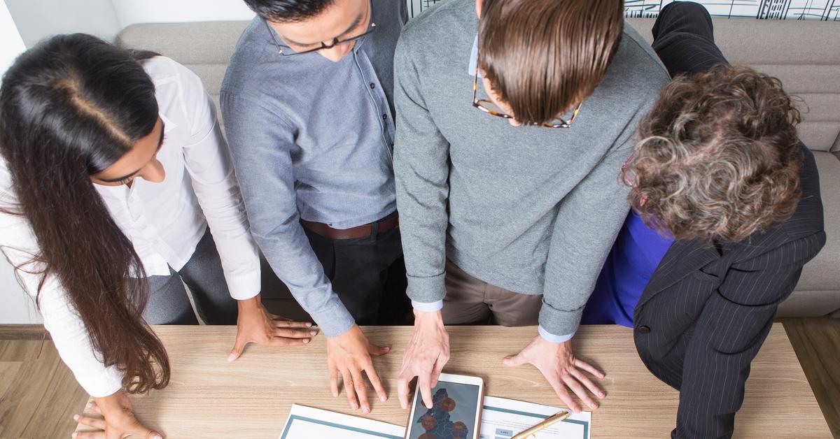 Cross-functional team collaboration training breaking organizational silos