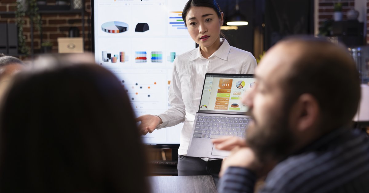 HR presenting training ROI data analytics to executive team