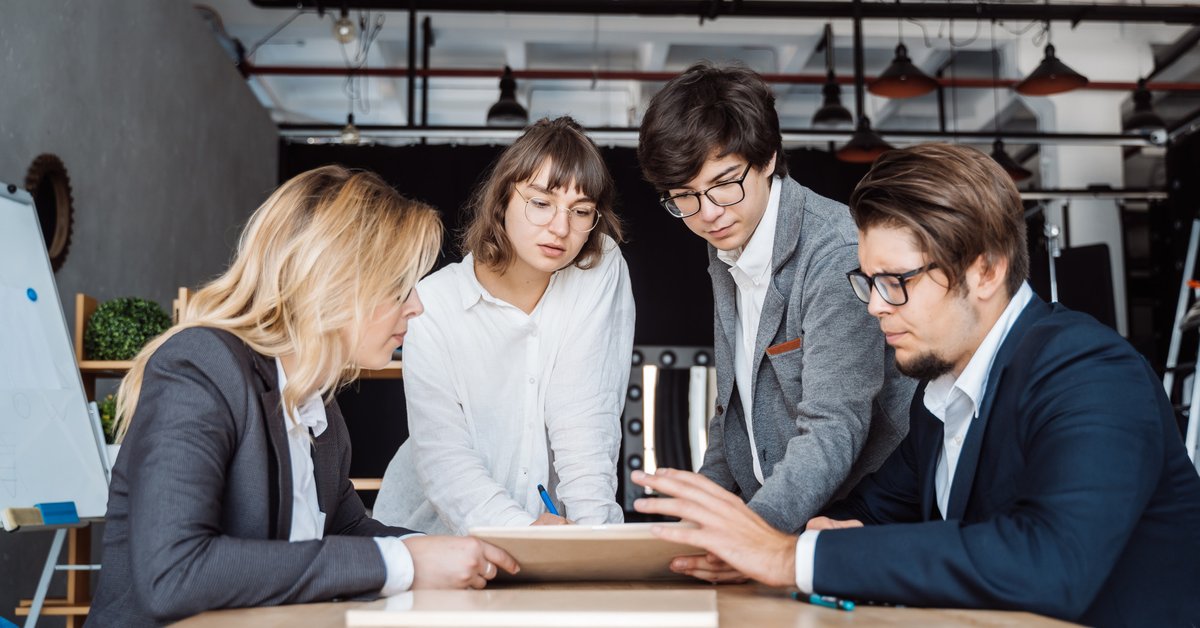 Team collaboration creating psychological safety in open meeting